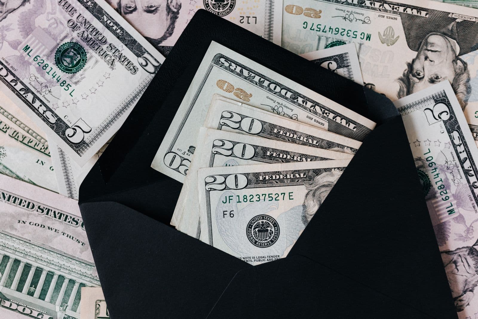 Calculator and notebook for reviewing mortgage payment scenarios as rates move