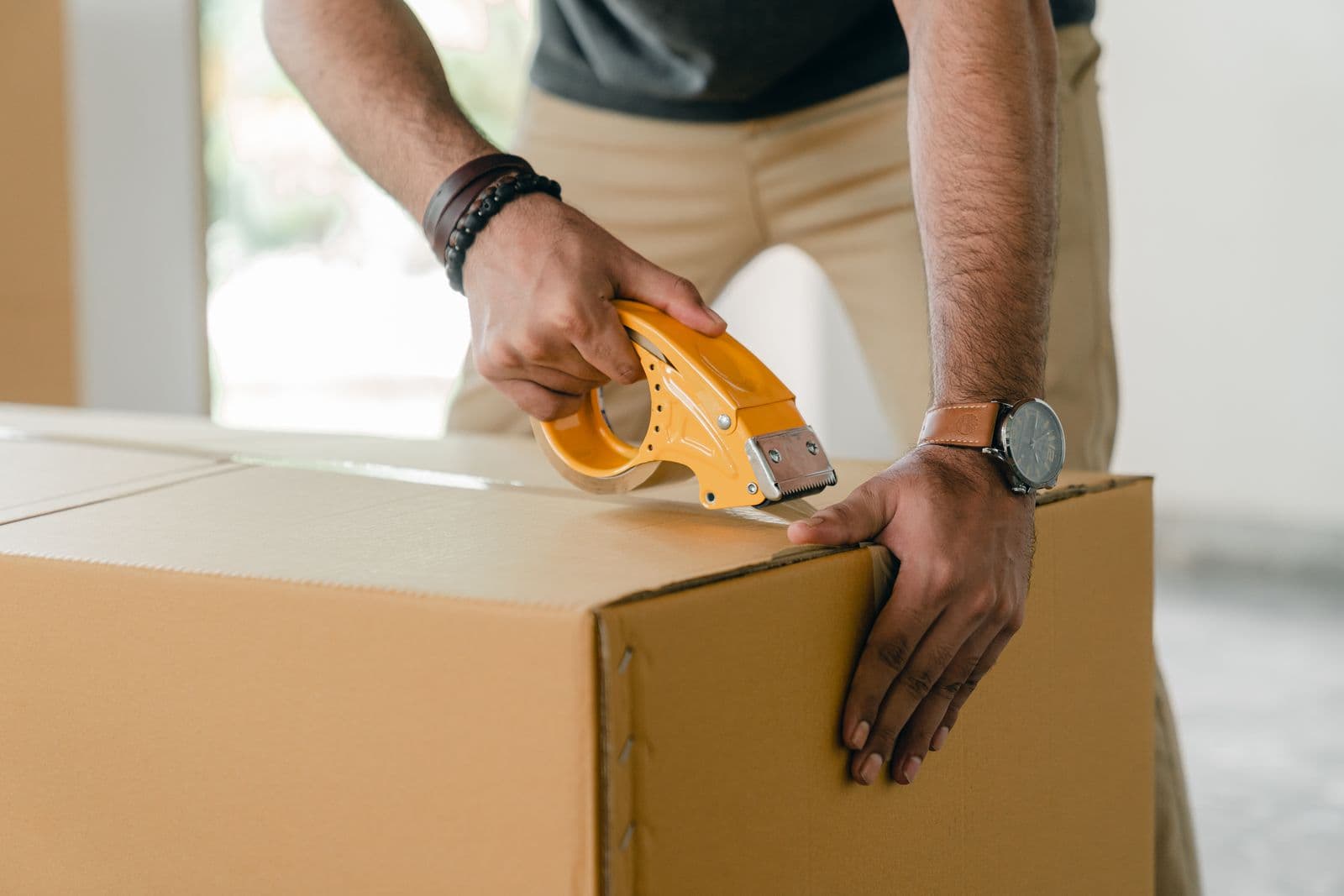 Packed moving boxes — tenant-occupied sales and transition planning