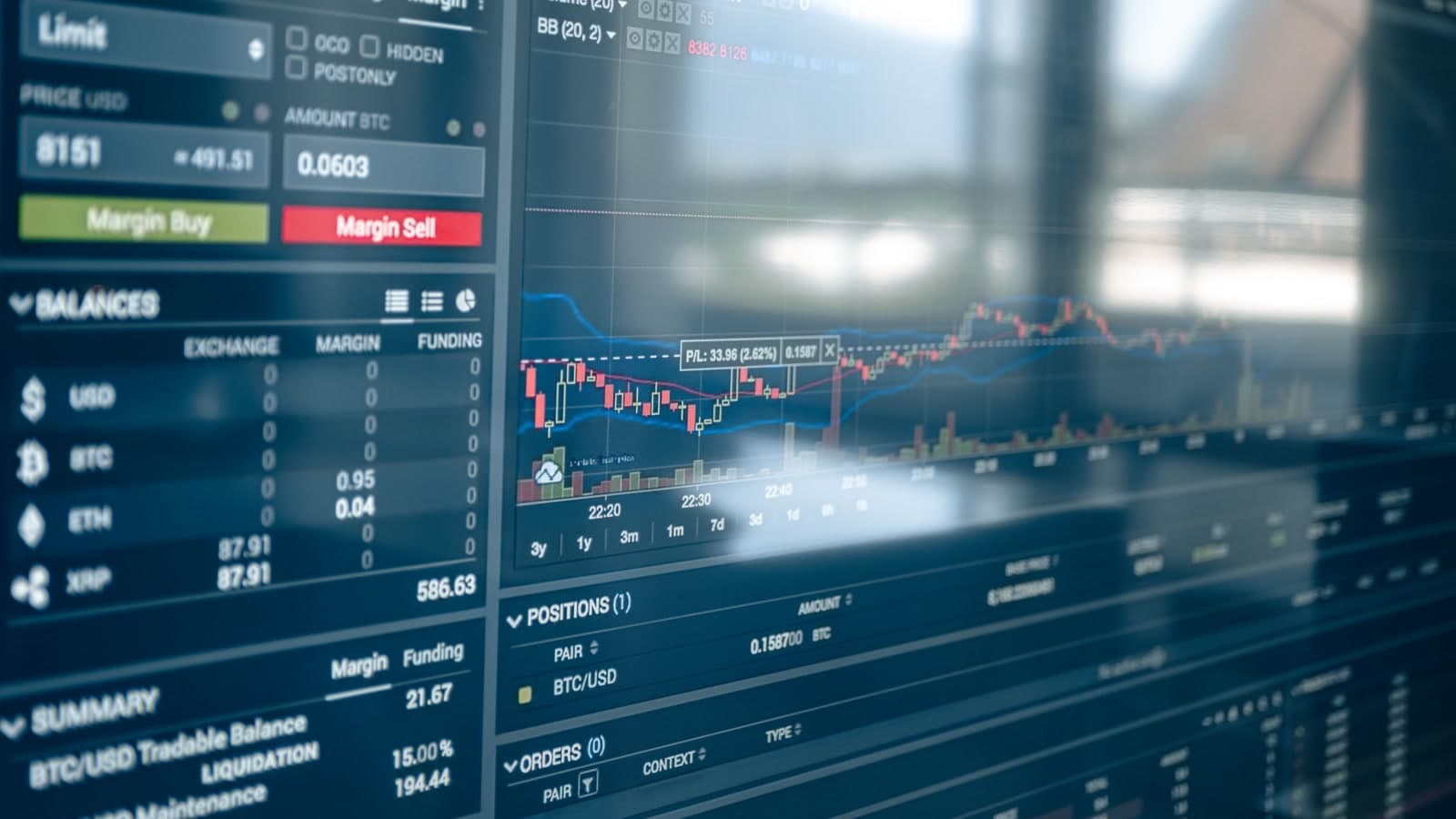 Stock exchange charts on a screen — context for how bond markets, not a single Fed headline, shape mortgage pricing