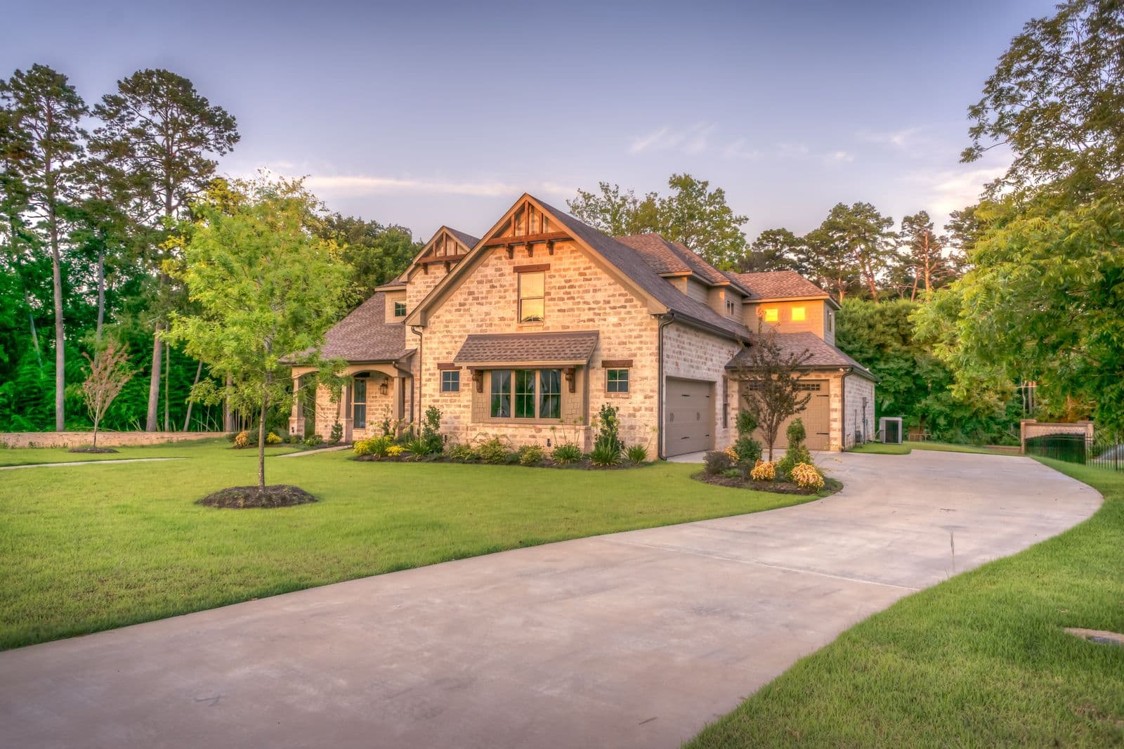 Single-family home with front porch and mature trees